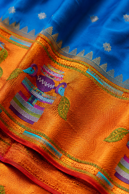 Paithani Silk Saree – Blue with Orange Zari Peacock Motif Border