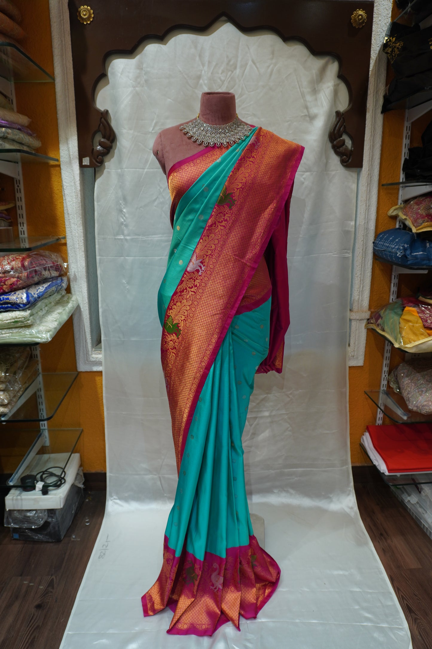 ZARTARI Handwoven Paithani Silk Saree – Turquoise Blue with Rani Pink Border & Rich Peacock Zari Weaving