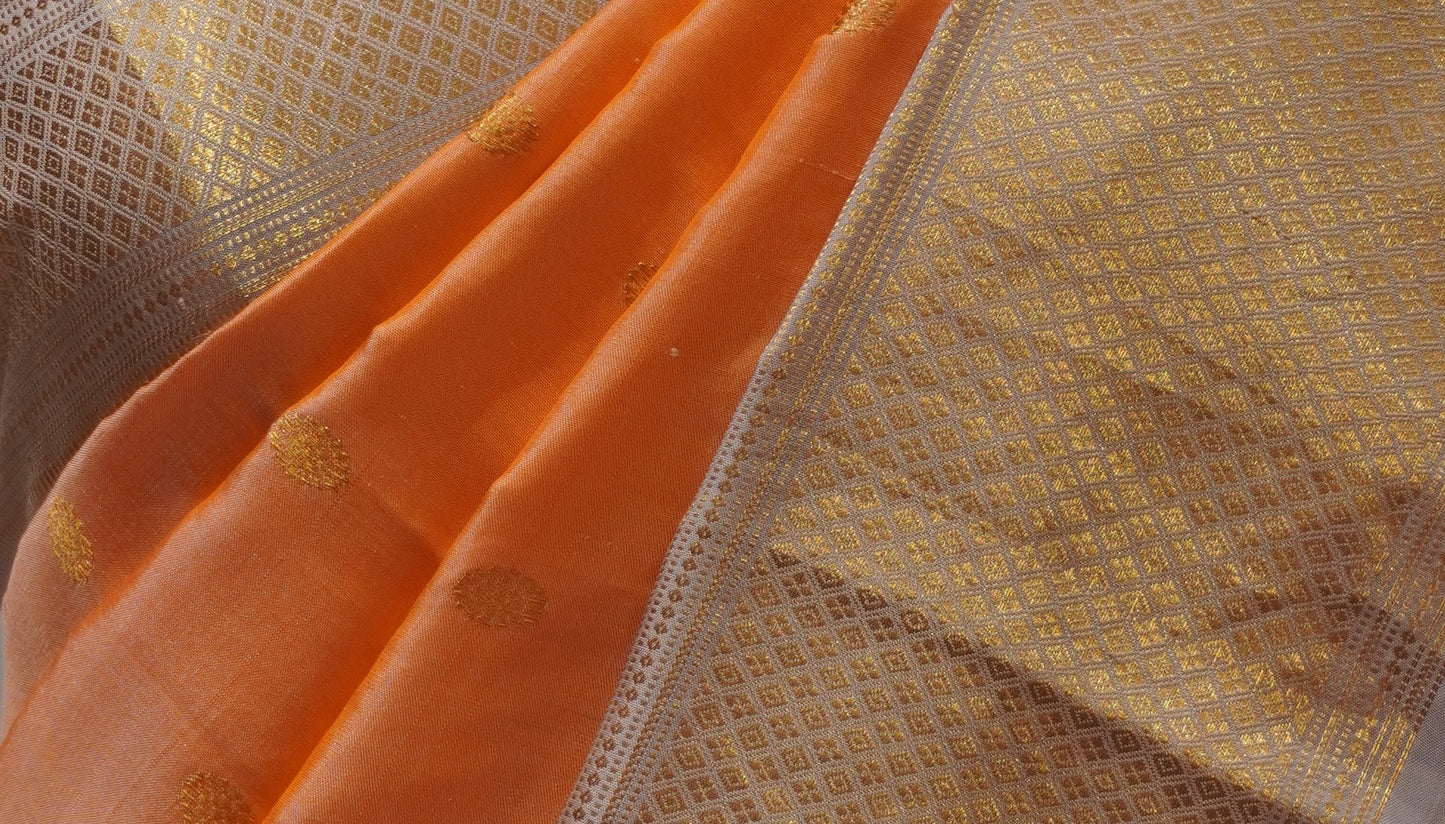 ZARTARI Handwoven Banarasi Silk Saree – Peach Orange with Silver-Gold Zari Border & Rich Woven Pallu