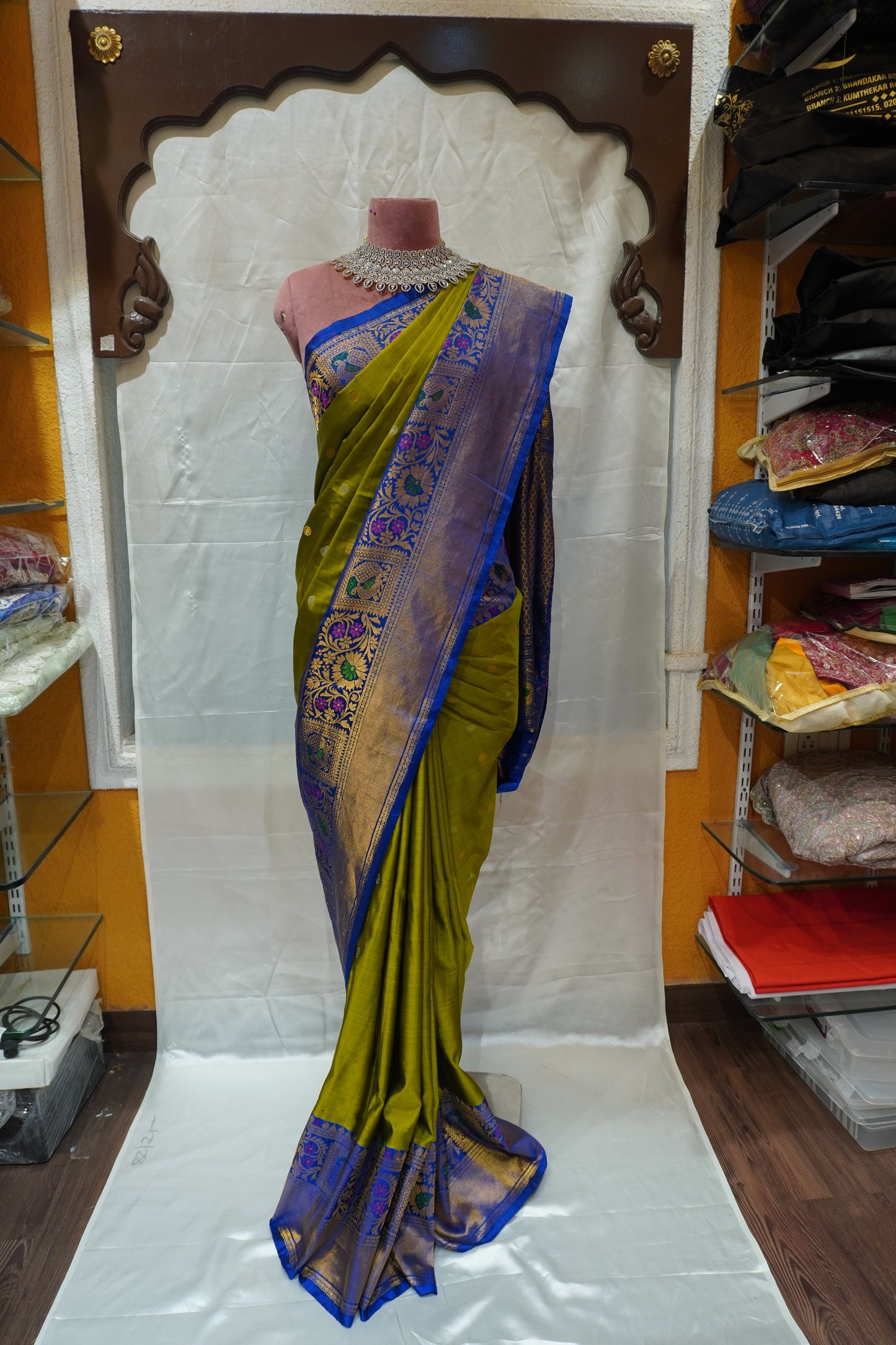 ZARTARI Handwoven Paithani Silk Saree – Olive Green with Royal Blue Floral Zari Border & Rich Woven Pallu