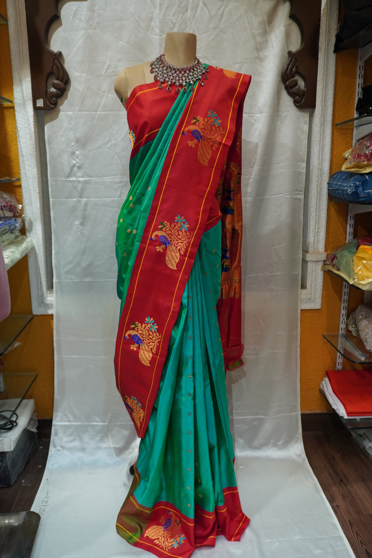 Premium Green Paithani Silk Saree with Rich Red Zari Border & Traditional Peacock Motifs